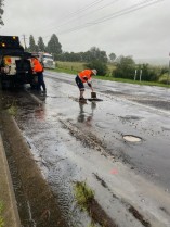 Crews working in rain